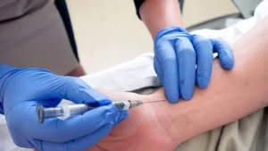 Certified nurse performing ABG injection at home in Gurgaon